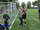 Laatste training S.K.N.W.K. JO11-1JM (partijtje tegen de ouders) van maandag 27 mei 2024 (125/137)